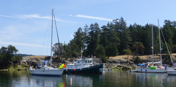 Boats anchored close to local shoreline