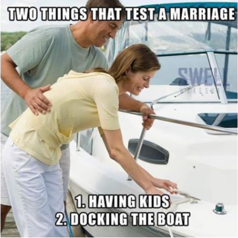 2 people docking a boat